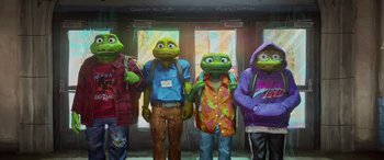 Movie still from “Teenage Mutant Ninja Turtles: Mutant Mayhem” (2023), directed by Jeff Rowe – A group of people standing next to each other in a room; Wide shot, Low angle
