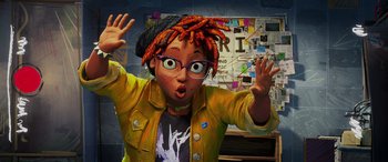 Movie still from “Teenage Mutant Ninja Turtles: Mutant Mayhem” (2023), directed by Jeff Rowe – A woman with a dread locks and a yellow jacket; Medium shot, Over the shoulder angle