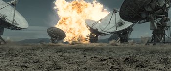 Movie still from “Terminator Salvation” (2009), directed by McG – Three satellite dishes in the middle of a field; Extreme Wide shot, High angle