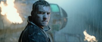 Movie still from “Terminator Salvation” (2009), directed by McG – A person with a wet shirt on; Close Up shot, Low angle