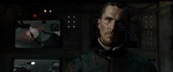 Movie still from “Terminator Salvation” (2009), directed by McG – A person wearing a jacket; Close Up shot, Low angle