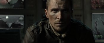 Movie still from “Terminator Salvation” (2009), directed by McG – A person wearing a jacket; Close Up shot, Low angle