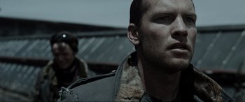 Movie still from “Terminator Salvation” (2009), directed by McG – A person wearing a jacket; Close Up shot, Over the shoulder angle