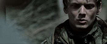 Movie still from “Terminator Salvation” (2009), directed by McG – A person wearing a jacket; Close Up shot, Over the shoulder angle