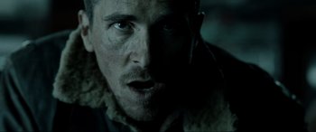 Movie still from “Terminator Salvation” (2009), directed by McG – A person wearing a jacket; Close Up shot, Low angle