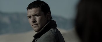 Movie still from “Terminator Salvation” (2009), directed by McG – A person wearing a jacket; Close Up shot, Over the shoulder angle