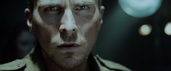 Movie still from “Terminator Salvation” (2009), directed by McG – A man's eyes and face; Close Up shot, Low angle