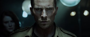 Movie still from “Terminator Salvation” (2009), directed by McG – A person wearing a shirt; Close Up shot, Low angle