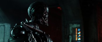 Movie still from “Terminator Salvation” (2009), directed by McG – The head of a robot in a dark room; Close Up shot, Low angle