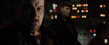 Movie still from “Terminator Salvation” (2009), directed by McG – A person wearing a jacket; Close Up shot, Low angle