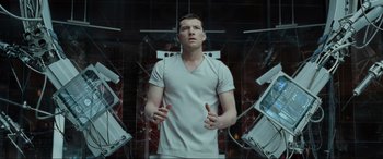 Movie still from “Terminator Salvation” (2009), directed by McG – A man standing in front of a wall of mirrors; Medium shot, Low angle