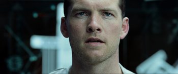Movie still from “Terminator Salvation” (2009), directed by McG – A man's face looking into the distance; Close Up shot, Low angle