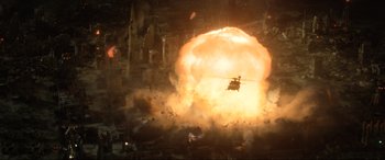 Movie still from “Terminator Salvation” (2009), directed by McG – A helicopter is flying through the air as a bomb explodes in the background; Extreme Wide shot, Overhead angle