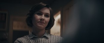 Movie still from “Tetris” (2023), directed by Jon S. Baird – A person with short brown hair; Close Up shot, Over the shoulder angle