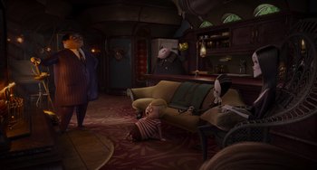 Movie still from “The Addams Family 2” (2021), directed by Greg Tiernan – A group of people in a living room with furniture; Wide shot, High angle