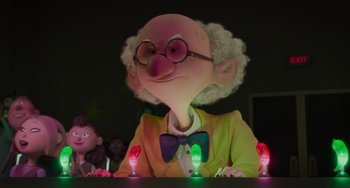 Movie still from “The Addams Family 2” (2021), directed by Greg Tiernan – A man in a yellow jacket and glasses sitting at a table with lights; Medium shot, Over the shoulder angle