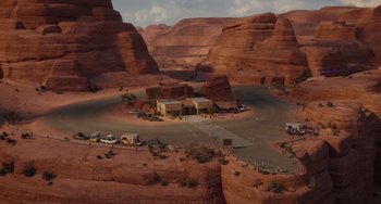 Movie still from “The Addams Family 2” (2021), directed by Greg Tiernan – An aerial view of an area in the middle of the desert; Extreme Wide shot, High angle