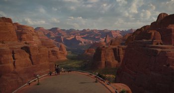 Movie still from “The Addams Family 2” (2021), directed by Greg Tiernan – People are standing on the side of a mountain; Extreme Wide shot, High angle