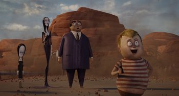 Movie still from “The Addams Family 2” (2021), directed by Greg Tiernan – An animated scene of a man and a woman and a child; Wide shot, High angle