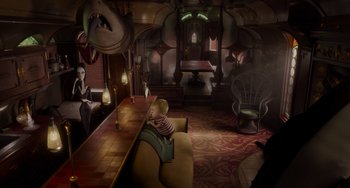 Movie still from “The Addams Family 2” (2021), directed by Greg Tiernan – An artistic rendering of a living room and dining room; Wide shot, High angle