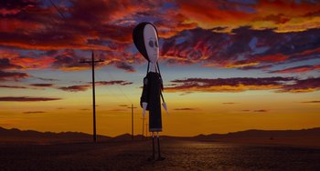 Movie still from “The Addams Family 2” (2021), directed by Greg Tiernan – An animated figure is standing in the middle of the desert; Wide shot, Low angle