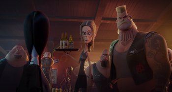 Movie still from “The Addams Family 2” (2021), directed by Greg Tiernan – A group of people standing in a room with a tray; Medium shot, Over the shoulder angle