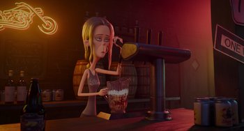 Movie still from “The Addams Family 2” (2021), directed by Greg Tiernan – A woman is pouring a glass of beer into a blender; Medium shot, Over the shoulder angle