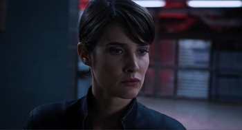 Movie still from “The Avengers” (2012), directed by Joss Whedon – A person with short hair; Close Up shot, Low angle