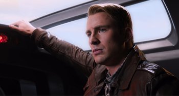Movie still from “The Avengers” (2012), directed by Joss Whedon – A person wearing a leather jacket; Close Up shot, Low angle