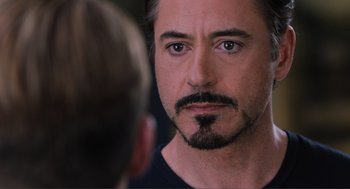 Movie still from “The Avengers” (2012), directed by Joss Whedon – A person with a beard; Close Up shot, Over the shoulder angle