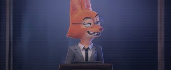 Movie still from “The Bad Guys” (2022), directed by Pierre Perifel – An animated fox wearing a suit and tie; Close Up shot, Over the shoulder angle