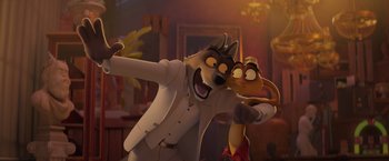 Movie still from “The Bad Guys” (2022), directed by Pierre Perifel – A couple of people that are standing up together; Medium shot, Over the shoulder angle