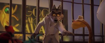 Movie still from “The Bad Guys” (2022), directed by Pierre Perifel – A cartoon wolf wearing a white suit and standing in front of a window; Medium shot, Over the shoulder angle