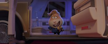 Movie still from “The Bad Guys” (2022), directed by Pierre Perifel – A cartoon character is standing in front of a window; Medium shot, Over the shoulder angle