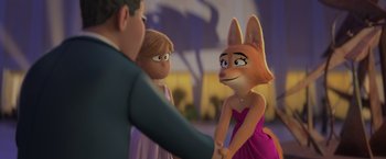 Movie still from “The Bad Guys” (2022), directed by Pierre Perifel – A couple of people standing next to each other in a room; Close Up shot, Over the shoulder angle