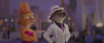 Movie still from “The Bad Guys” (2022), directed by Pierre Perifel – A cartoon of a woman and a man dressed in suits; Close Up shot, Over the shoulder angle