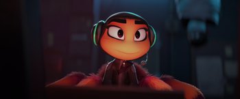 Movie still from “The Bad Guys” (2022), directed by Pierre Perifel – An animated character wearing headphones and sitting in a chair; Extreme Close Up shot, High angle