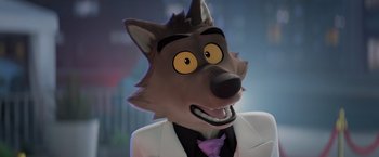 Movie still from “The Bad Guys” (2022), directed by Pierre Perifel – A cartoon wolf wearing a white suit and purple bow tie; Close Up shot, High angle