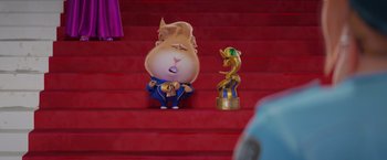 Movie still from “The Bad Guys” (2022), directed by Pierre Perifel – A cartoon character sitting on top of a red staircase; Medium shot, Low angle