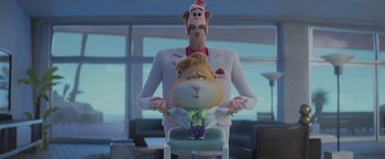 Movie still from “The Bad Guys” (2022), directed by Pierre Perifel – A man and a woman are sitting in a chair; Medium shot, Low angle