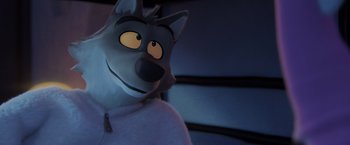 Movie still from “The Bad Guys” (2022), directed by Pierre Perifel – A wolf's face in a room; Close Up shot, Overhead angle