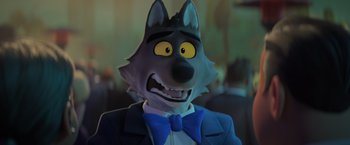 Movie still from “The Bad Guys” (2022), directed by Pierre Perifel – A cartoon of a wolf wearing a blue bow tie; Close Up shot, High angle