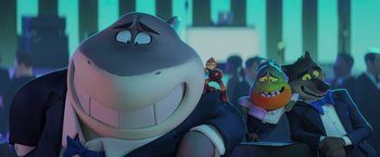 Movie still from “The Bad Guys” (2022), directed by Pierre Perifel – A cartoon character with other cartoon characters in the background; Medium shot, Over the shoulder angle
