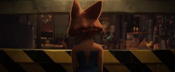 Movie still from “The Bad Guys” (2022), directed by Pierre Perifel – A person with a fox head on their head; Close Up shot, Over the shoulder angle