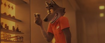 Movie still from “The Bad Guys” (2022), directed by Pierre Perifel – A cartoon of a wolf holding something in his hand; Extreme Close Up shot, High angle