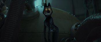 Movie still from “The Bad Guys” (2022), directed by Pierre Perifel – A dog that is sitting down in the dark; Medium shot, High angle