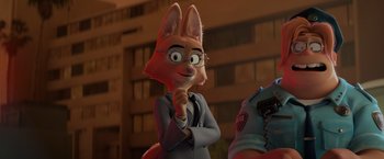 Movie still from “The Bad Guys” (2022), directed by Pierre Perifel – A cartoon of a fox wearing a suit and glasses; Close Up shot, Over the shoulder angle