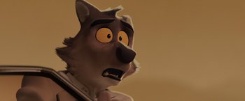 Movie still from “The Bad Guys” (2022), directed by Pierre Perifel – A wolf's face with an expression of fear; Close Up shot, Over the shoulder angle