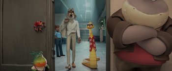 Movie still from “The Bad Guys” (2022), directed by Pierre Perifel – A couple of people standing next to each other in a room; Wide shot, High angle