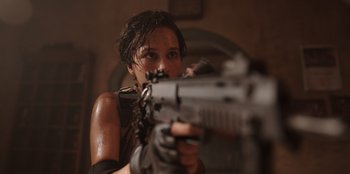 Movie still from “The Big 4” (2022), directed by Timo Tjahjanto – A woman is holding a gun in her hand; Close Up shot, Over the shoulder angle